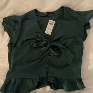 Green silk short sleeved blouse